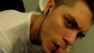 Boy sucking cock and eating cock in restroom.