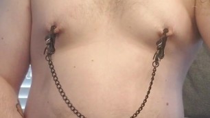 Chubby boy masturbating and playing with nipple clamps