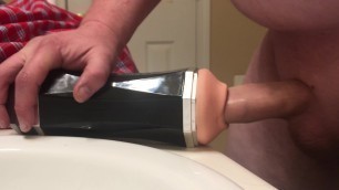Fucking the flesh toy in the bathroom with a big finish
