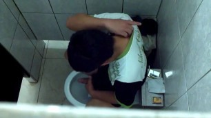 spy boy in public toilet